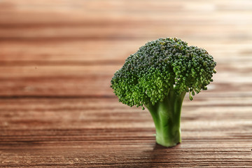 Fresh broccoli on wooden table
