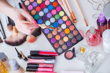 Collection of make up products displayed on the table