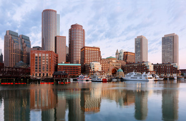 Fototapeta na wymiar Boston Financial District before sunrise viewing from Fan Pier Park, Boston, Massachusetts, USA