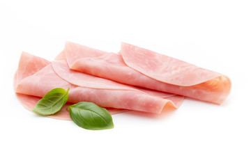 Thin slices of ham on white background.