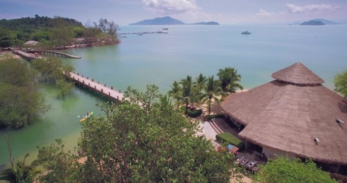 Luxury Bungalows Set in a Lagoon on Phayam Island, Thailand, Aerial Flyover Shot
