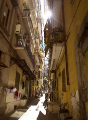 Poster Narrow street in old town of Naples city in Italy © Mikolaj Niemczewski
