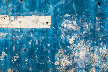 Textured background of old rough blue wall