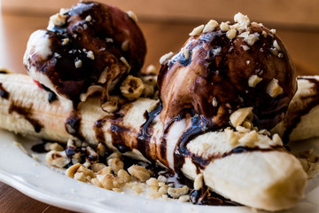 Banana Split with ice cream, chocolate sauce and Hazelnuts.
