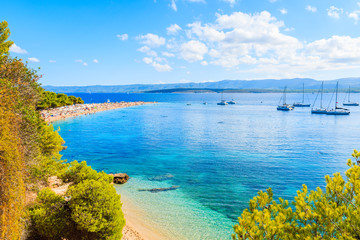 View of Zlatni Rat beach (Golden Horn) with beautiful sea water, most famous beach of Adriatic Sea, Brac island, Croatia