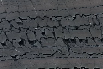 Keuken spatwand met foto Close up of gray and black. quartzite stone texture. © Dmytro Synelnychenko
