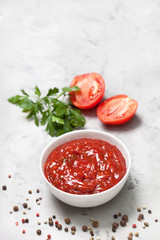 tomato sauce in a white bowl