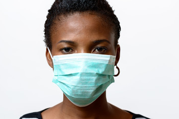 Young African woman wearing a face mask