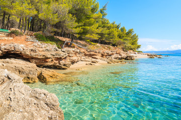 Fototapeta premium Beautiful turquoise sea water on small beach on coast of Brac island near Bol town, Croatia