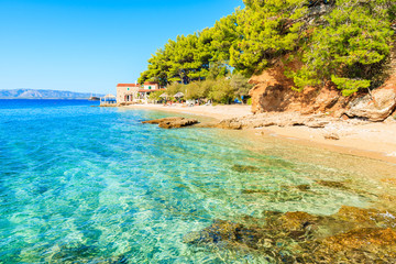 Obraz premium Sea bay and beach with turquoise crystal clear water in Bol town, Brac island, Croatia