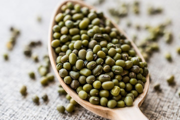 Mung Beans in wooden spoon.
