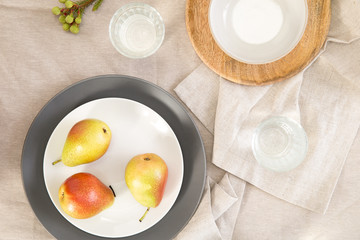 Pears in a plate on the table