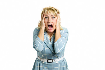 Portrait of screaming desperate woman. Mature woman yelling frustrated screaming out loud and...