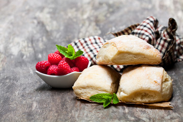 Homemade  fresh sourdough buns with on rustic wooden table