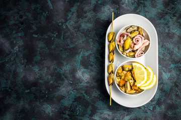 Seafood mix, mussels, calamari, octopus. Top view, copy space.