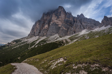 Fototapeta na wymiar Cloudy panorama of Tofana di Rozes southern wall , Cortina d'Ampezzo, Italy