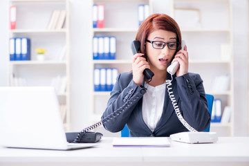 Frustrated call center assistant responding to calls