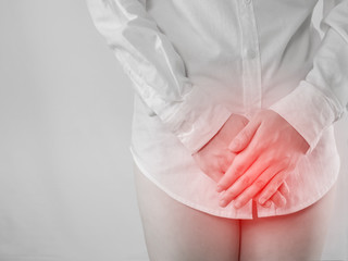 woman's hand closed the body part, The concept of women's period cramps