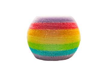 Round shower sponge with rainbow stripes isolated on white background