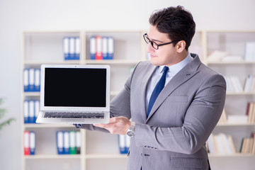 Young businessman working in the office