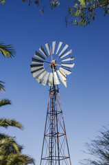 Pinwheel / Old windmill, alternative energy generation by wind energy.