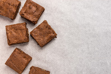 homemade chocolate brownies on white background.
