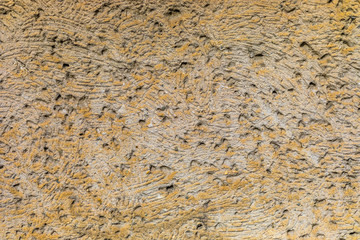 White concrete wall with natural texture and cracks on the surface as background