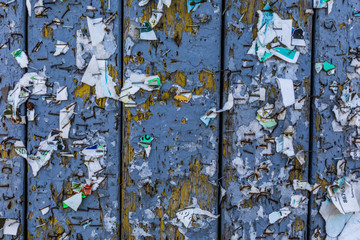 Old Urban Billboard With Torn Peeled Poster Abstract Horizontal Background. Outdoor Bulletin Board...
