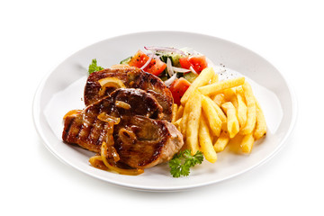 Grilled beefsteak with french fries on white background 