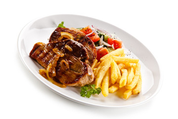 Grilled beefsteak with french fries on white background 