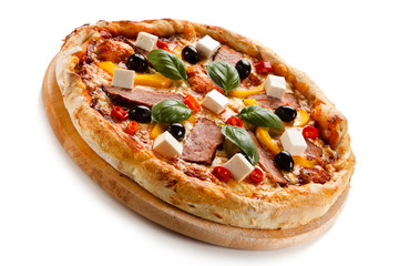 Pizza with ham and feta cheese and vegetables on white background