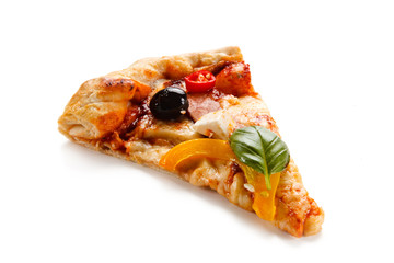 Pizza with ham and feta cheese and vegetables on white background