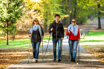 Nordic walking - active people working out 