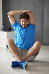 Young man doing stretching
