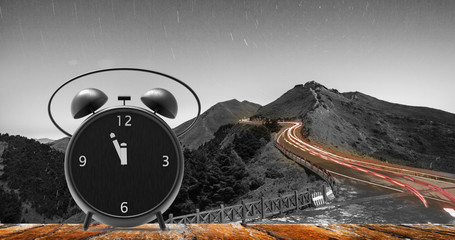 alarm clock with little minutes to twelve o'clock