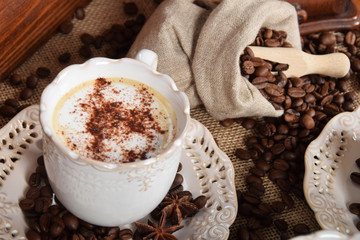 coffee with chocolate and cacao chocolate cake and a bag of coffee beans