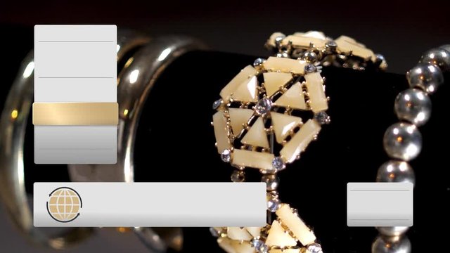 A fictional, QVC-like home shopping television content screen. Slowly rotating golden jewelry items with blank graphical boxes along the sides for your custom text descriptions.  	
