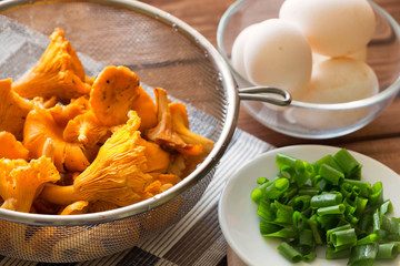 Chanterelle mushrooms and eggs and fresh chives for the breakfast