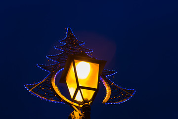 Vintage street lamp, and golden bokeh lights overlay