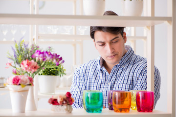 Young handsome man shopping in shop