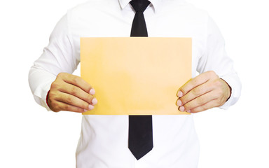 Man holding brown blank paper. Concept of businessman with copy space.