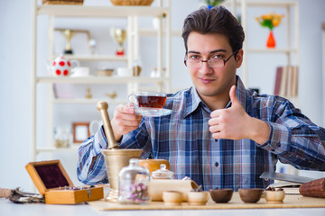 Fototapeta na wymiar Professional tea expert trying new brews