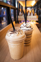 Coffee frappe in plastic cup. Favorite for coffee lover. In cafe view.