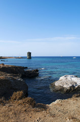 Corsica, 28/08/2017: la Torre di Santa Maria della Chiapella (1549), il rudere della torre genovese sulla spiaggia di Santa Maria lungo il Sentier des Douaniers, il sentiero costiero di Capo Corso 