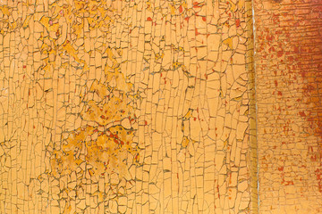 Peeling paint on old wooden rustic material on the wall. Wood texture backgrounds.