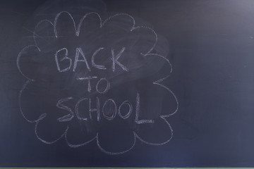 Back to school written on a blackboard