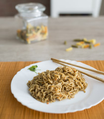 Yakisoba / noodles with beef in rectangle plate with bamboo stic