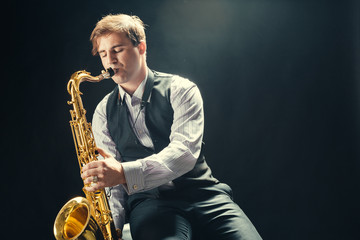 Young man playing the Saxophone