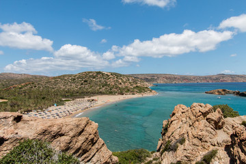 Fototapeta premium Beach of tourists in crete greece with palm trees