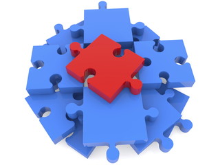 Puzzle pieces in blue with red one on top view